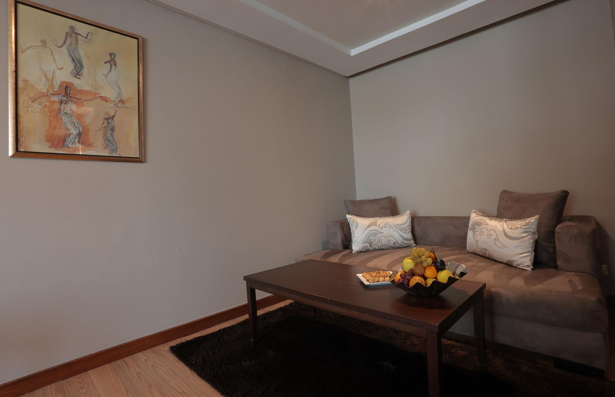 레 팔레세 단파 호텔 카사블랑카 외부 사진 A living room in a suite at the hotel