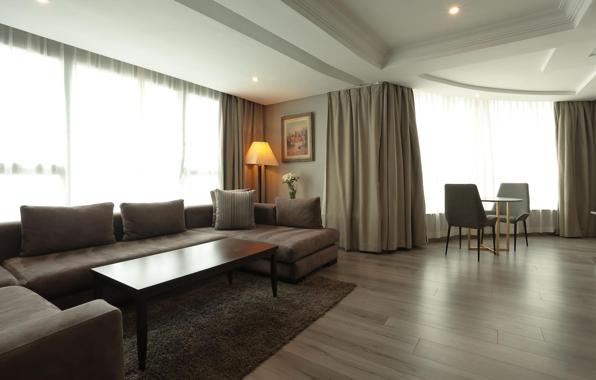 레 팔레세 단파 호텔 카사블랑카 외부 사진 A living room in a suite at the hotel